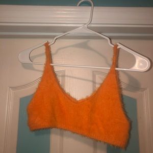 Fuzzy orange crop top